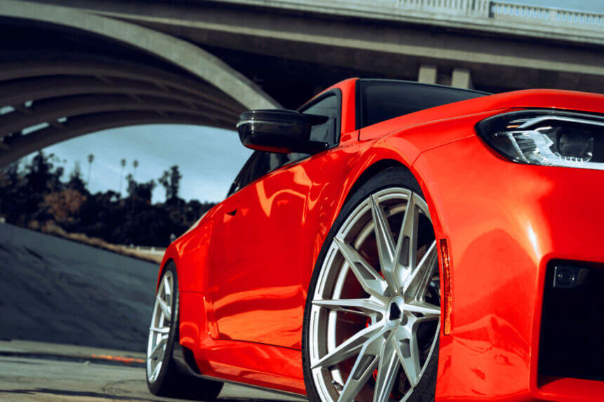 Custom drilled wheels showing precise bolt pattern holes machined in blank wheel for vehicle fitment