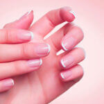 Gel Hard Gel nail enhancement application process showing UV curing light and professional nail tools for durable manicure