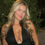 Jacy Lee Florida TikTok creator smiling in casual outfit for social media content creation photo