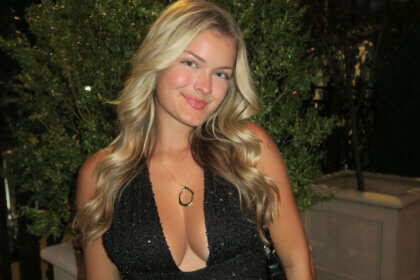 Jacy Lee Florida TikTok creator smiling in casual outfit for social media content creation photo