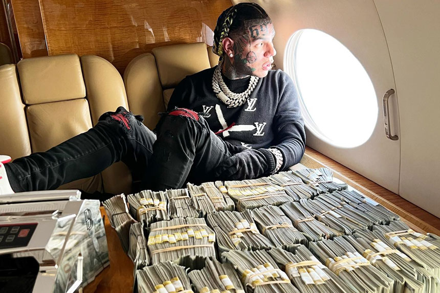 6ix9ine net worth decline from 28 million to 1.5 million showing rapper financial troubles and IRS asset seizure