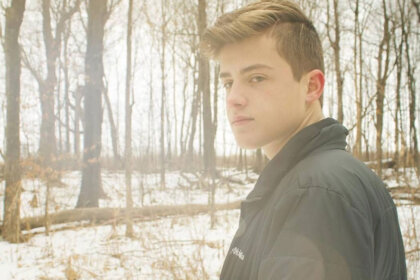 Braydon Wald commissioning engineer working on building systems verification at construction site