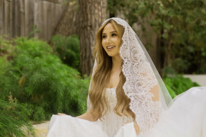 Catherine Paiz in wedding dress outdoors representing her net worth and financial success from YouTube career