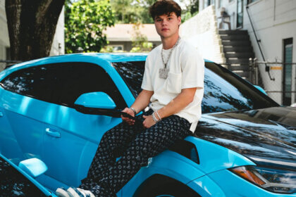 Jack Doherty net worth 2025 showing YouTuber with luxury cars and mansion reflecting his earnings from content creation