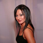 Sandra Romain at industry event showcasing her professional success related to Sandra Romain net worth