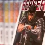 Berserk Manga volume cover featuring Guts the Black Swordsman in detailed armor illustration