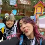 GEM Sisters net worth photo showing Mercedes and Evangeline Lomelino at theme par