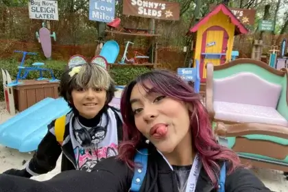 GEM Sisters net worth photo showing Mercedes and Evangeline Lomelino at theme par