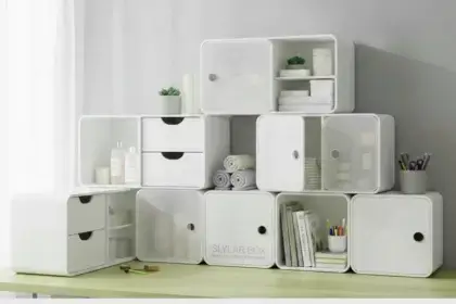 Slylar Box modular storage system with white stackable cubes, drawers, and compartments arranged on desk for home organization