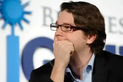 Andrew Mason net worth profile photo showing the Groupon founder and Descript executive chairman at a business event