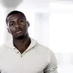 Desmond Mason net worth profile showing the former NBA player and artist in a professional setting