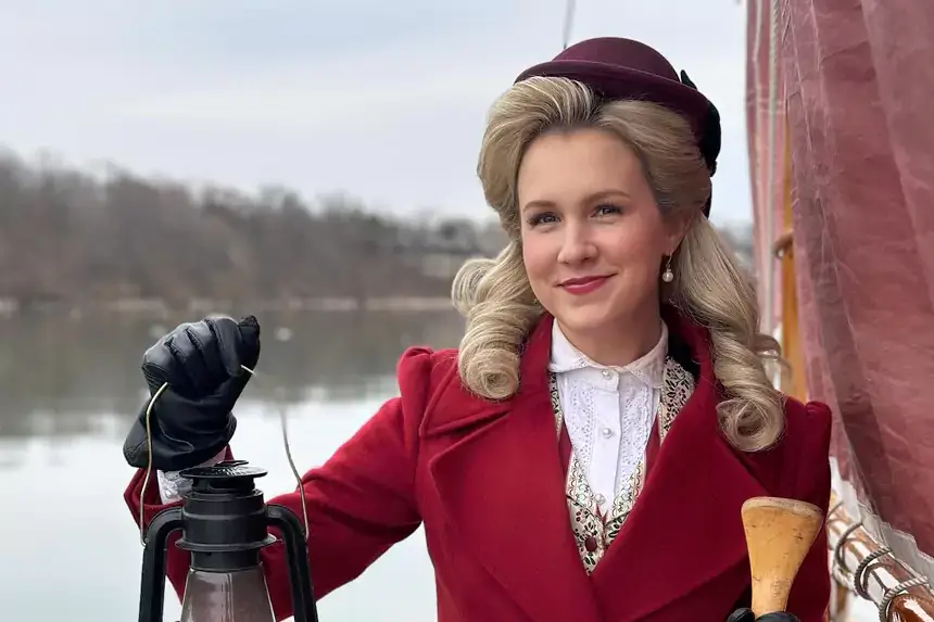 Ginna Claire Mason in costume portraying a character in period attire demonstrating her successful acting career that contributes to her net worth