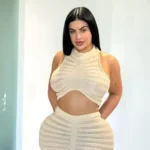 Lissa Aires posing in white outfit showing her success as influencer contributing to Lissa Aires net worth