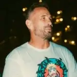 Manuel Ferrara looking thoughtful in casual attire, representing his successful career and net worth journey