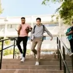 college students walking on campus dealing with academic and daily life challenges