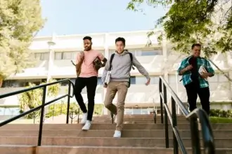 college students walking on campus dealing with academic and daily life challenges