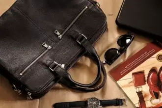 Leather briefcase and accessories showing signs of wear for leather repair shop in Brandywine Valley