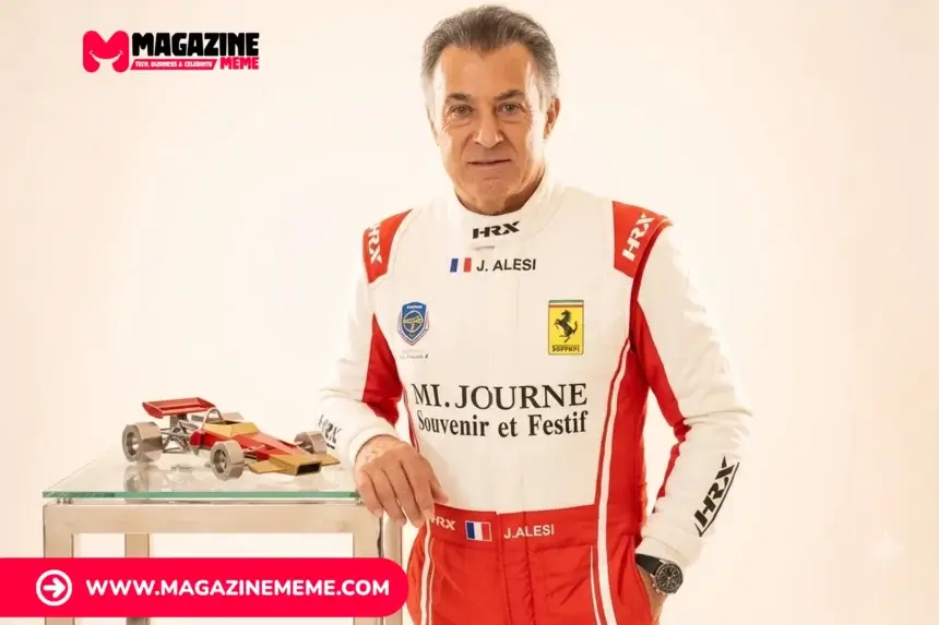 Jean Alesi in a Ferrari-branded HRX racing suit standing beside a scale model Formula 1 car