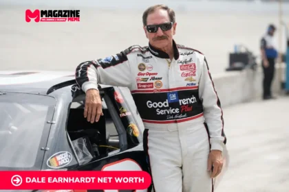 Dale Earnhardt in white and black racing suit beside his No. 3 Chevrolet on pit road