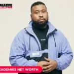 DJ Akademiks in a blue windbreaker for the DJ Akademiks net worth article