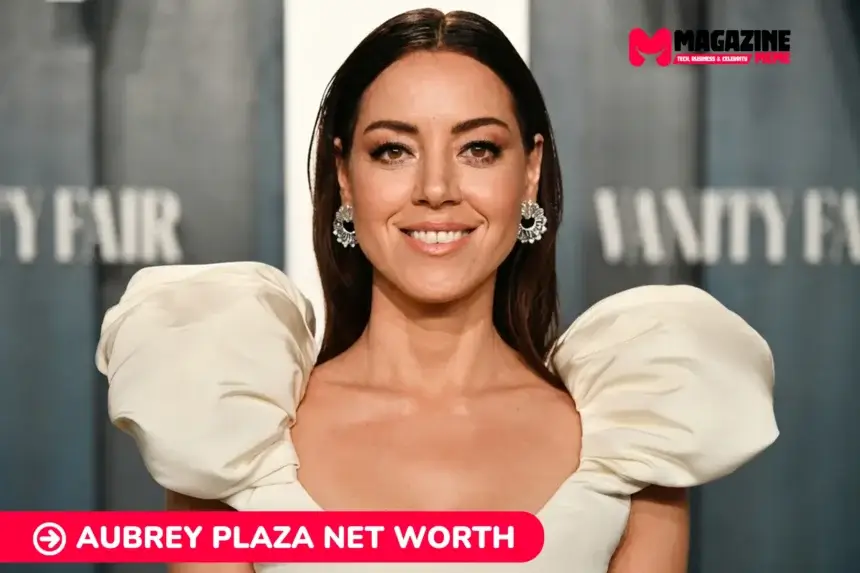 Aubrey Plaza net worth smiling in cream puff-sleeve gown for article portrait